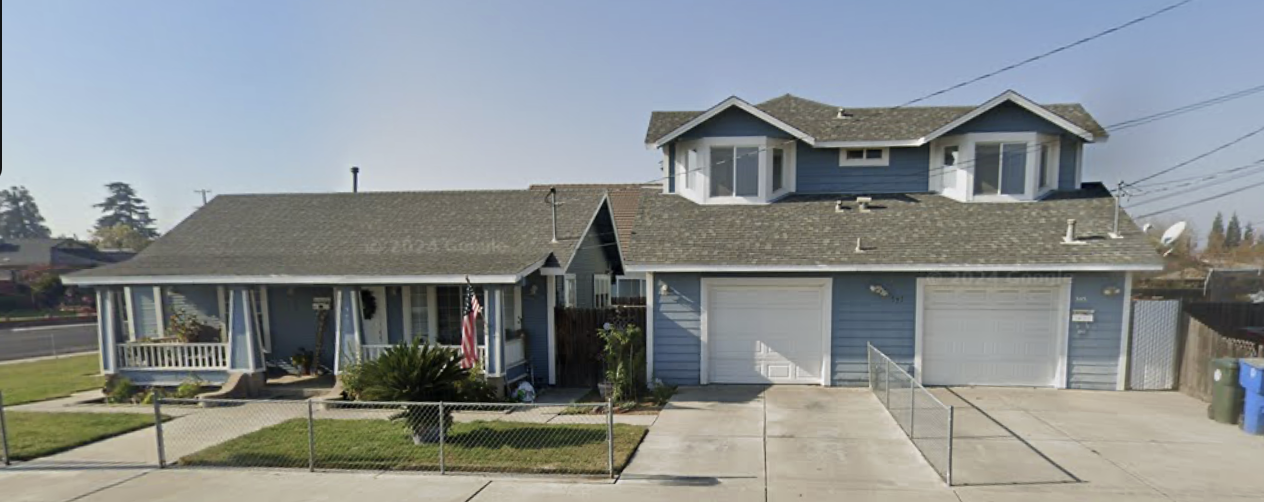 Two story blue home with double garage in Northern California